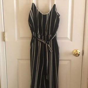 Black/off white striped belted Capri jumpsuit.